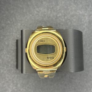 Timex SSQ Gold-Plated Oval Digital Watch with Vintage Charm