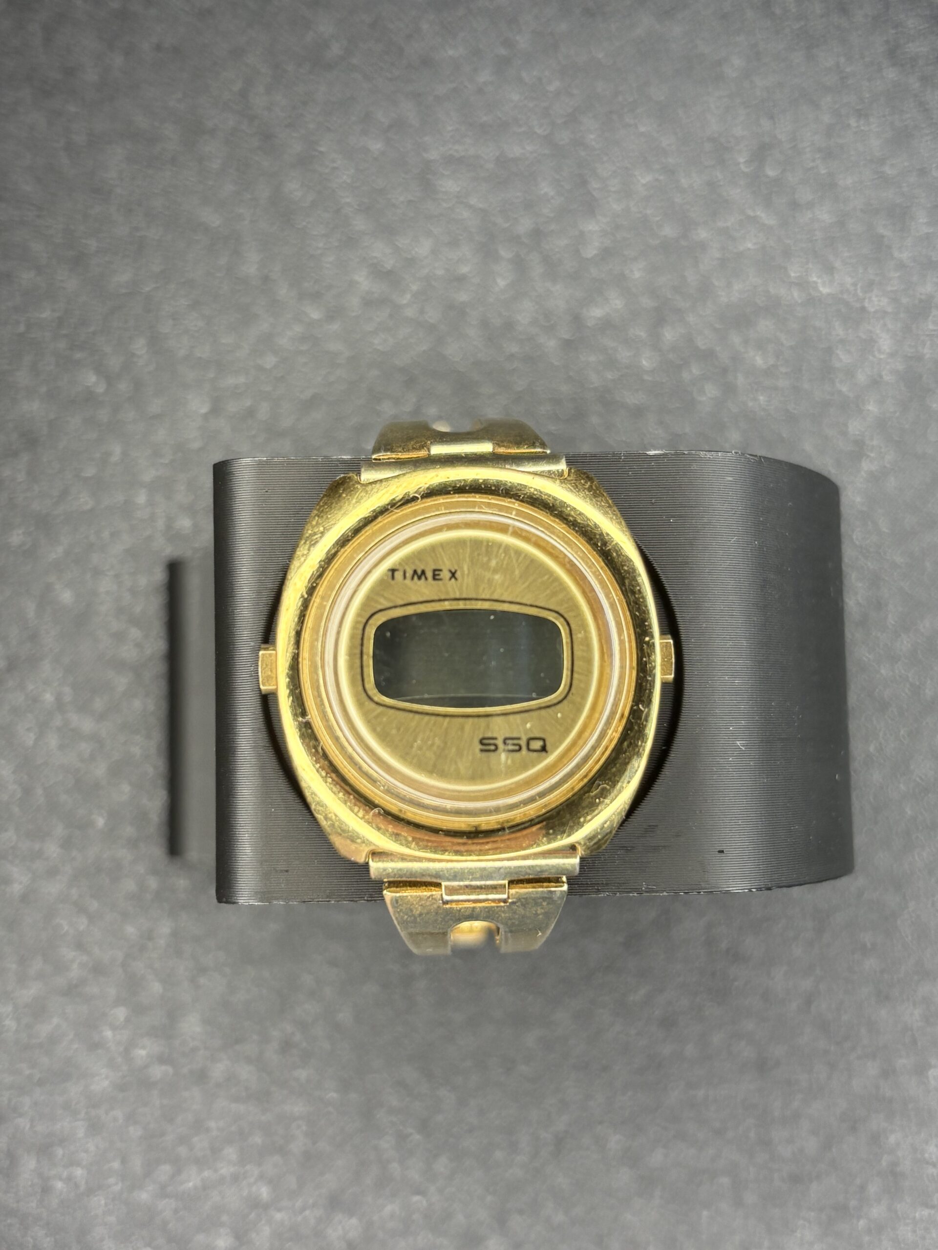 Timex SSQ Gold-Plated Oval Digital Watch with Vintage Charm