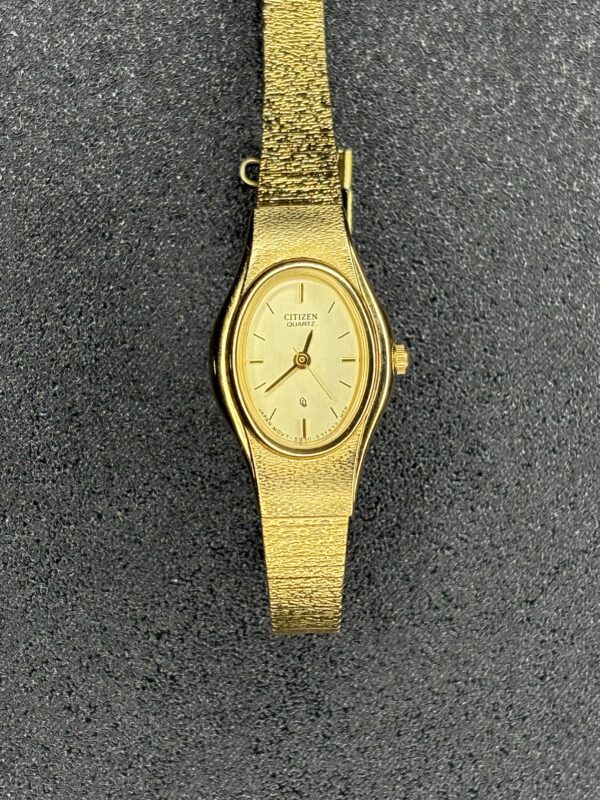 Citizen Women’s Quartz Watch Gold Tone Textured Band Case Number 7920