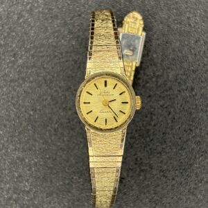 ules Jurgensen Women’s Quartz Watch Gold Tone Textured Band