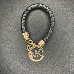 Micheal Kors Black And Gold Bracelet